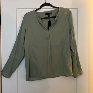 Green silk blouse